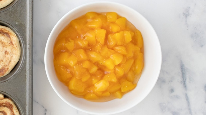 bowl of canned peaches