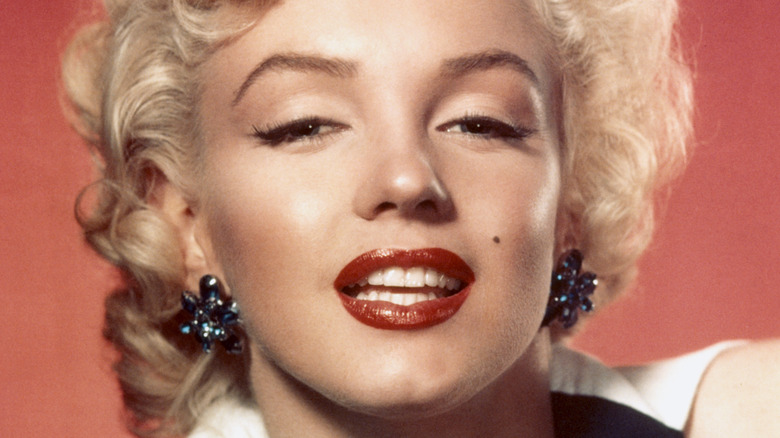 Marilyn Monroe wearing red lipstick