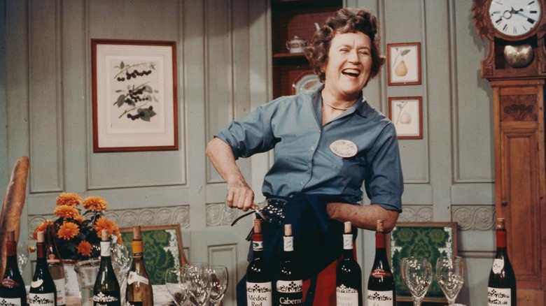 Julia Child opening wine