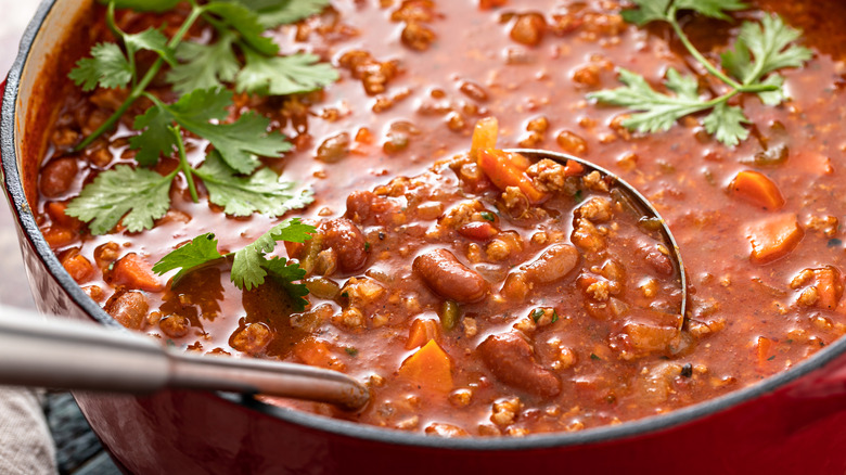 pot of chili with ladle