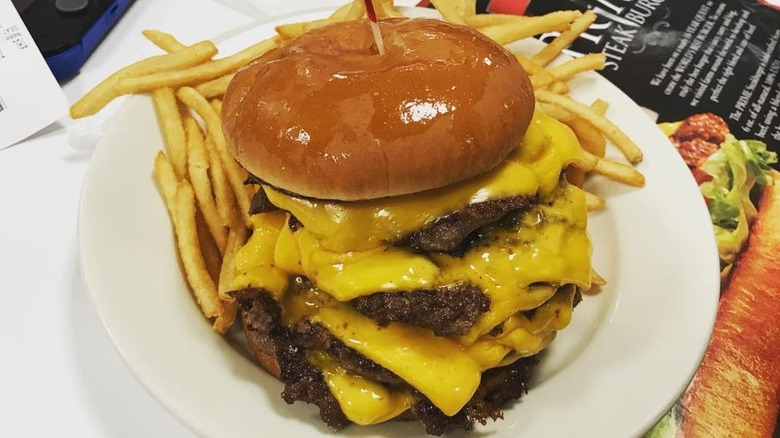 Steak 'n Shake 7x7 burger on white plate