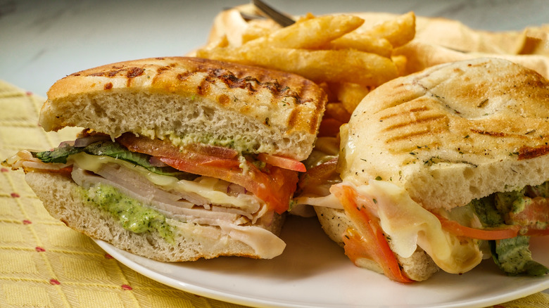 turkey pesto sandwich with fries