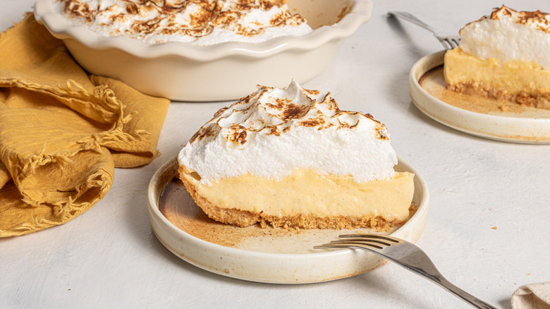 Slice of Canadian flapper pie on a plate with a fork