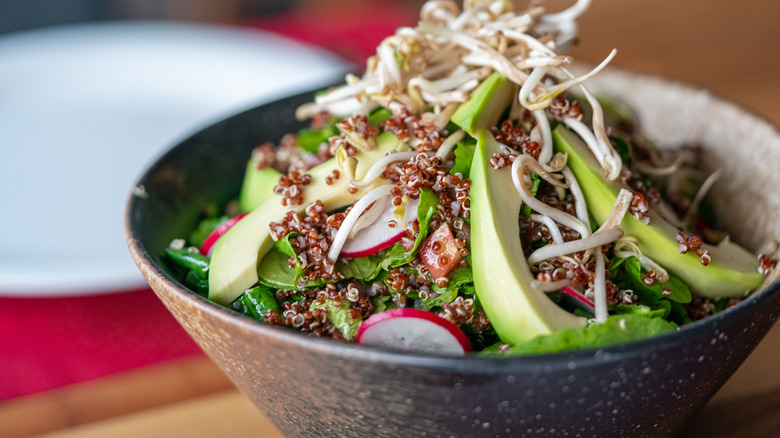 Quinoa avocado rustic salad bowl