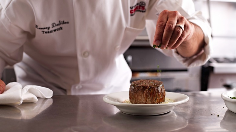 Ruth's Chris chef making a Filet