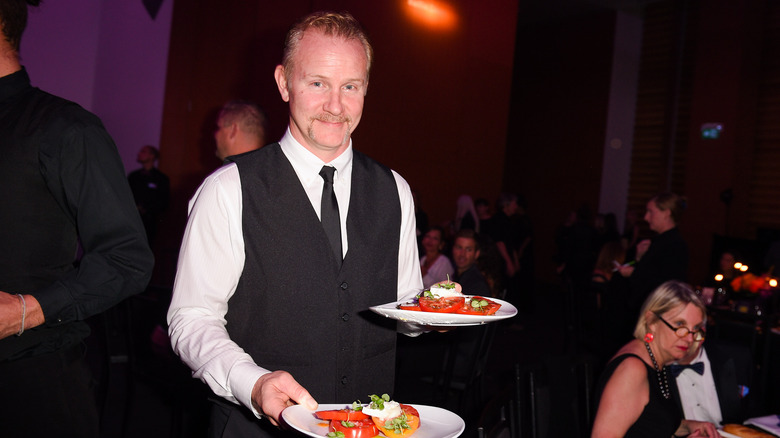 Morgan Spurlock serving food 