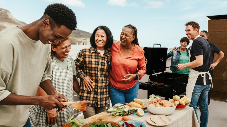 happy people with grilled food