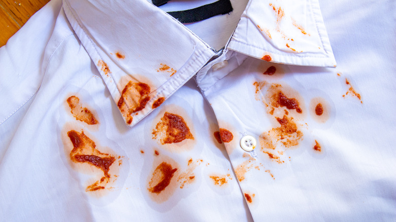 tomato sauce on white shirt