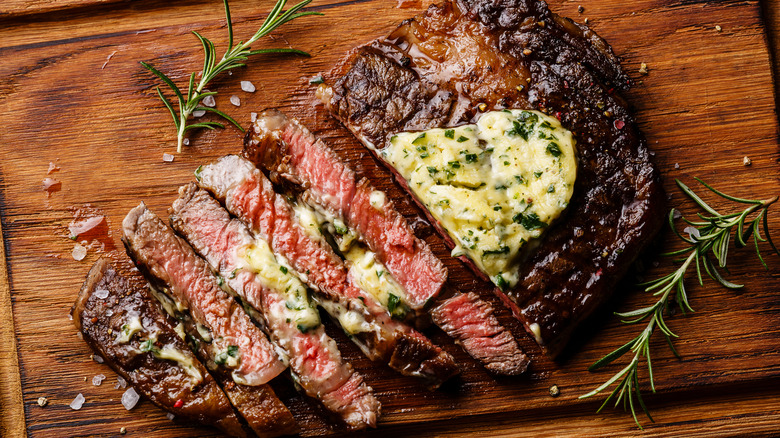 medium-rare steak sliced butter rosemary