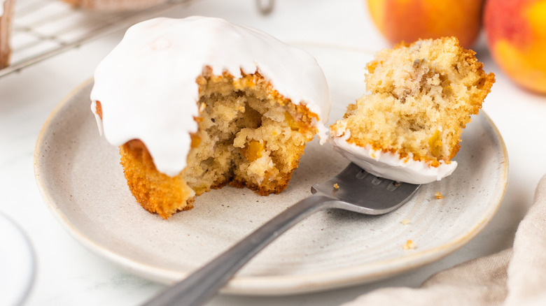 glazed peach muffin on plate