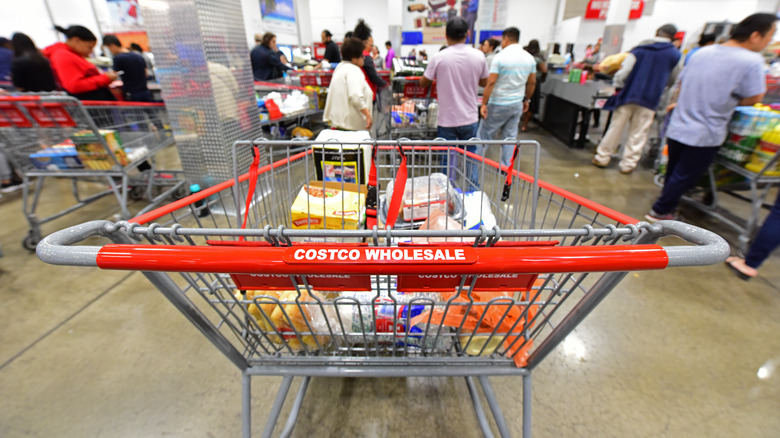 Shoppers at Costco checkout station