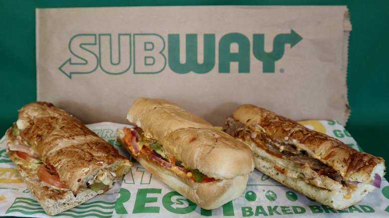 three Subway subs on wrapper