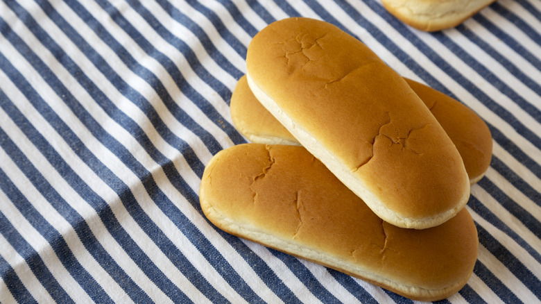 Hot dog buns on table 