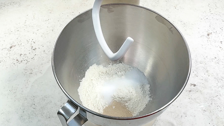 flour, yeast, sugar, and salt in mixing bowl