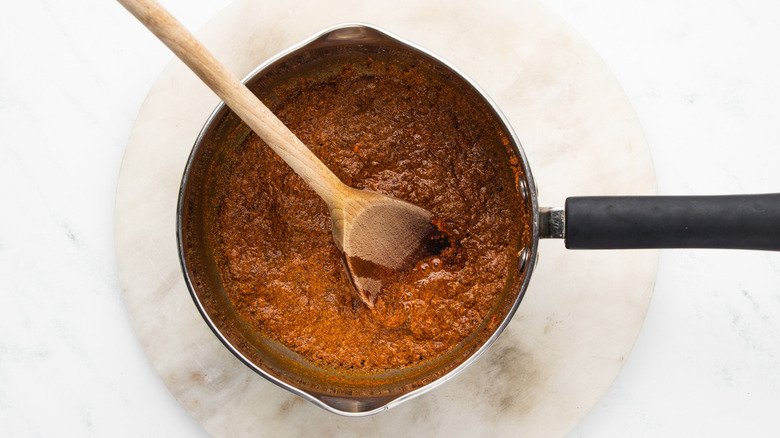 spice mixture cooking in saucepan