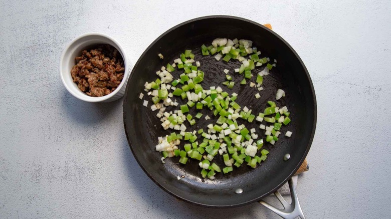 bell pepper and onion in a skillet