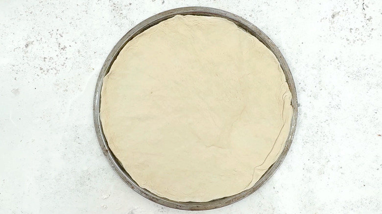 dough on pizza pan