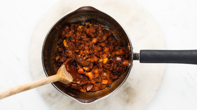 sauce base cooking in saucepan