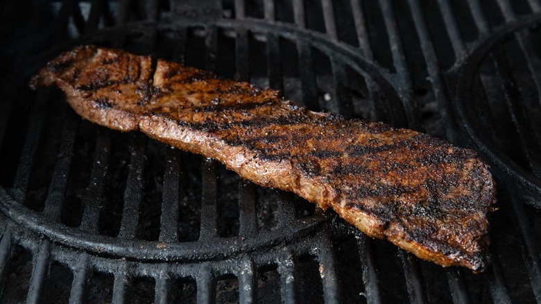 grilled skirt steak on a grill