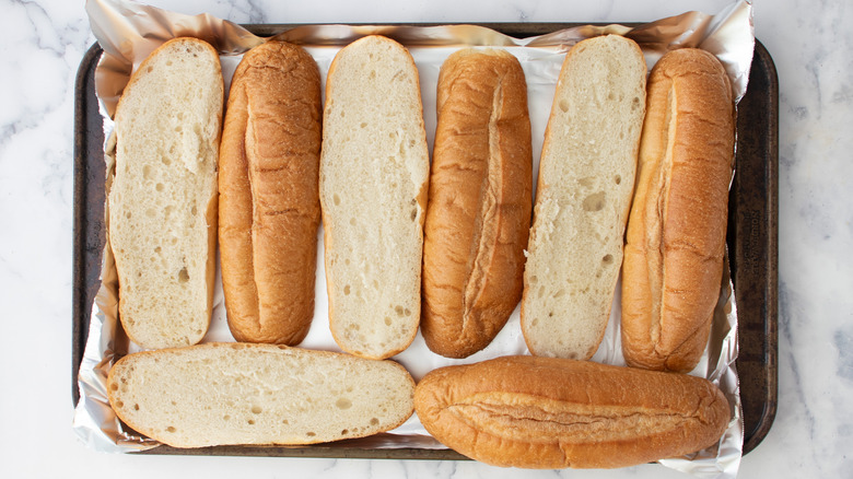 hoagie rolls on baking sheet