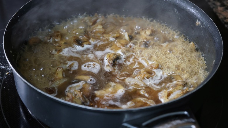 simmering skillet of sauce