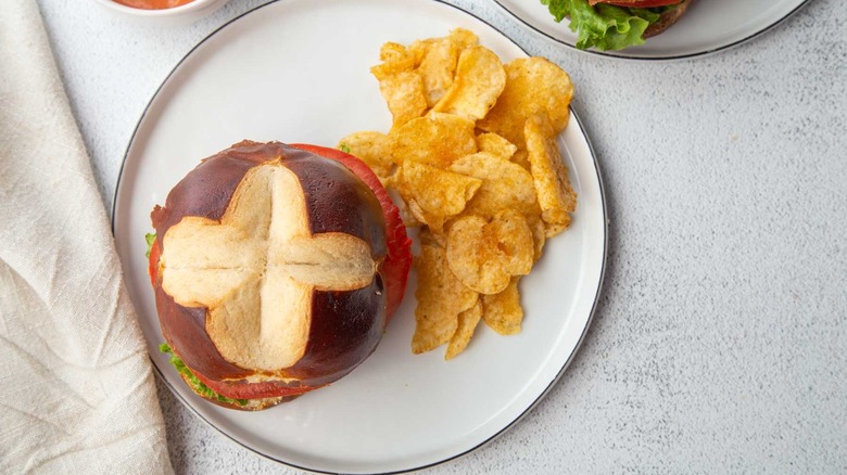 burger and chips on a plate